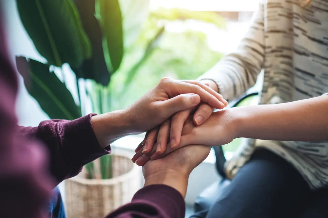 a man and a woman holding each other hands for com 2026 03 13 04 16 34 utc Large | Voyager Recovery Center