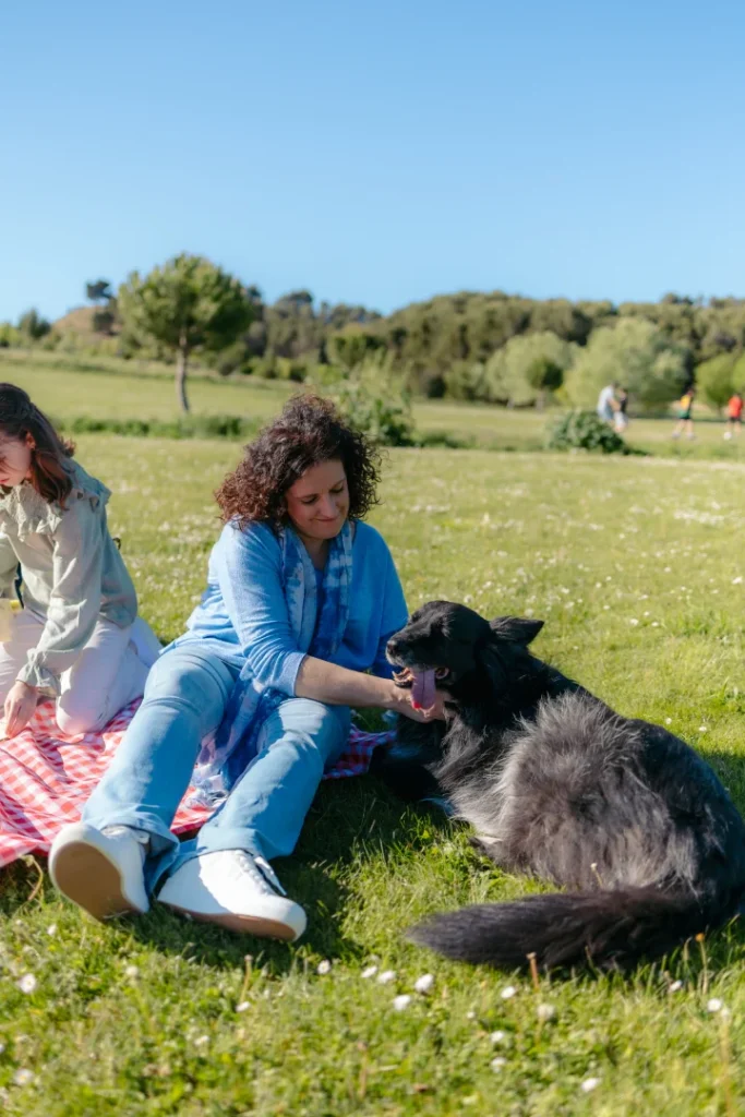mother and daughter petting their dog while having 2026 01 09 10 38 46 utc | Voyager Recovery Center