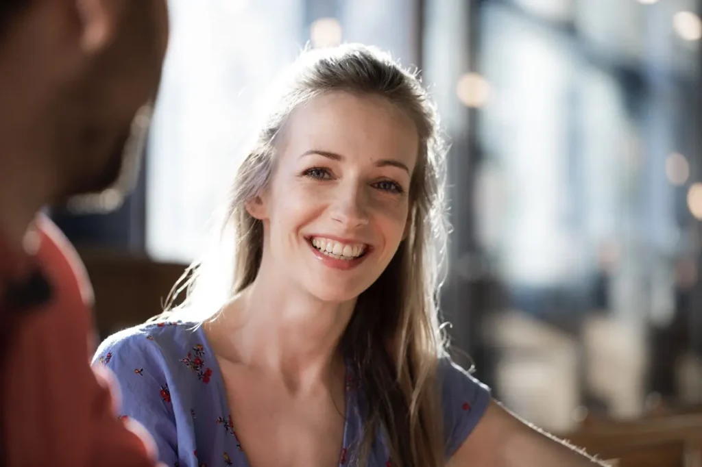 porrait of smiling woman in a cafe 2026 03 09 04 28 51 utc Large | Voyager Recovery Center