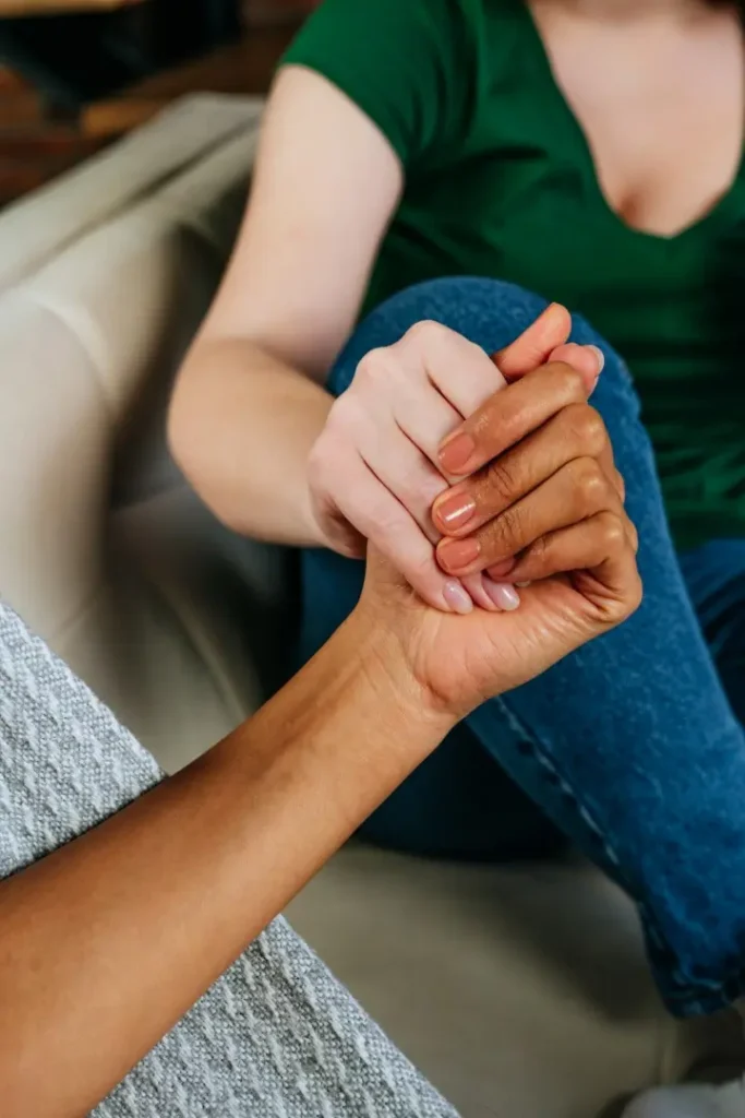 supportive gesture holding hands at home indoors 2026 01 07 05 31 03 utc | Voyager Recovery Center