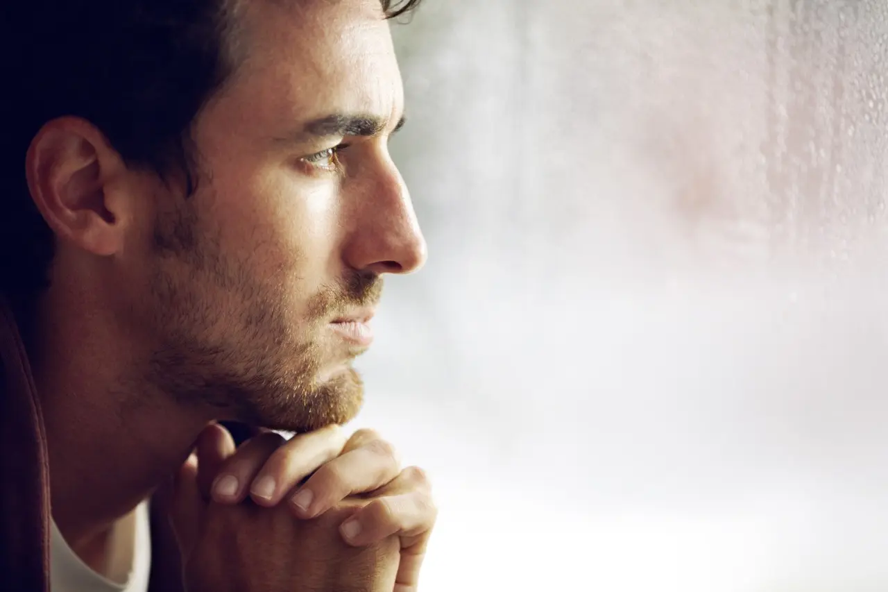 pensive man resting chin on clasped hands 2026 03 25 04 46 12 utc Large | Voyager Recovery Center