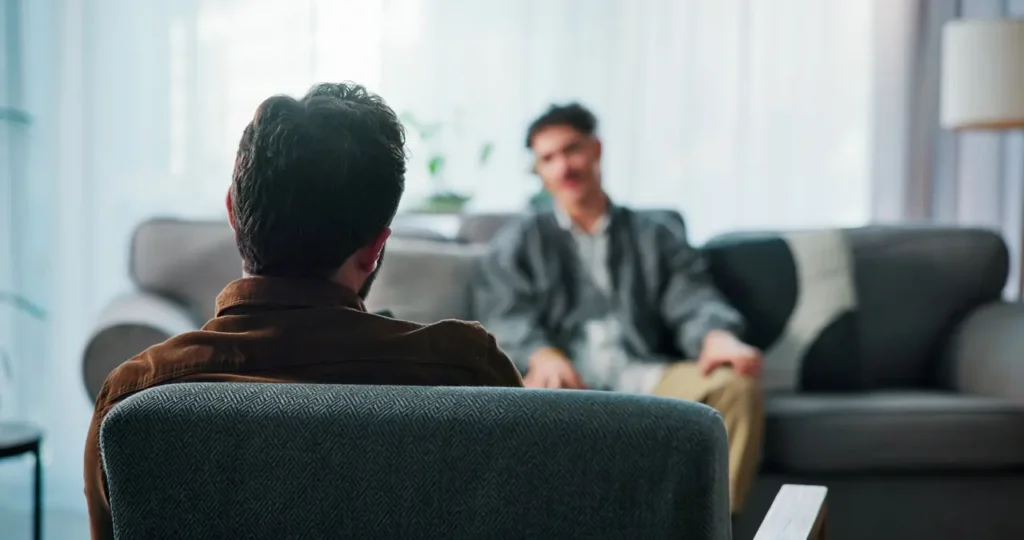 talking sofa and therapist with patient in office 2026 06 11 20 48 45 utc Large | Voyager Recovery Center