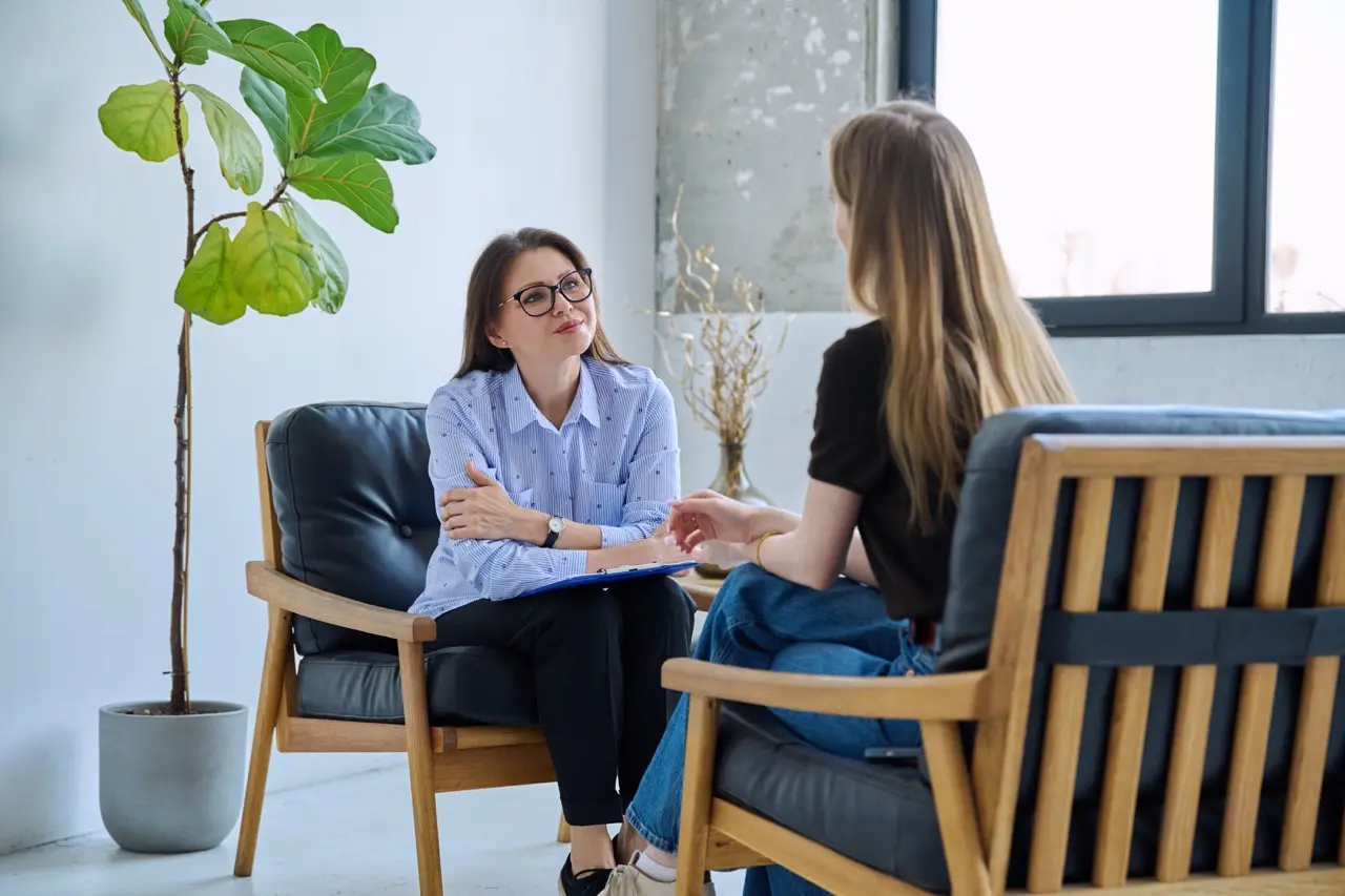 woman consults with therapist indoors on neutral b 2026 03 26 10 31 43 utc Large | Voyager Recovery Center